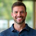 Energetic and approachable headshot of Mark Thompson, a certified personal trainer.